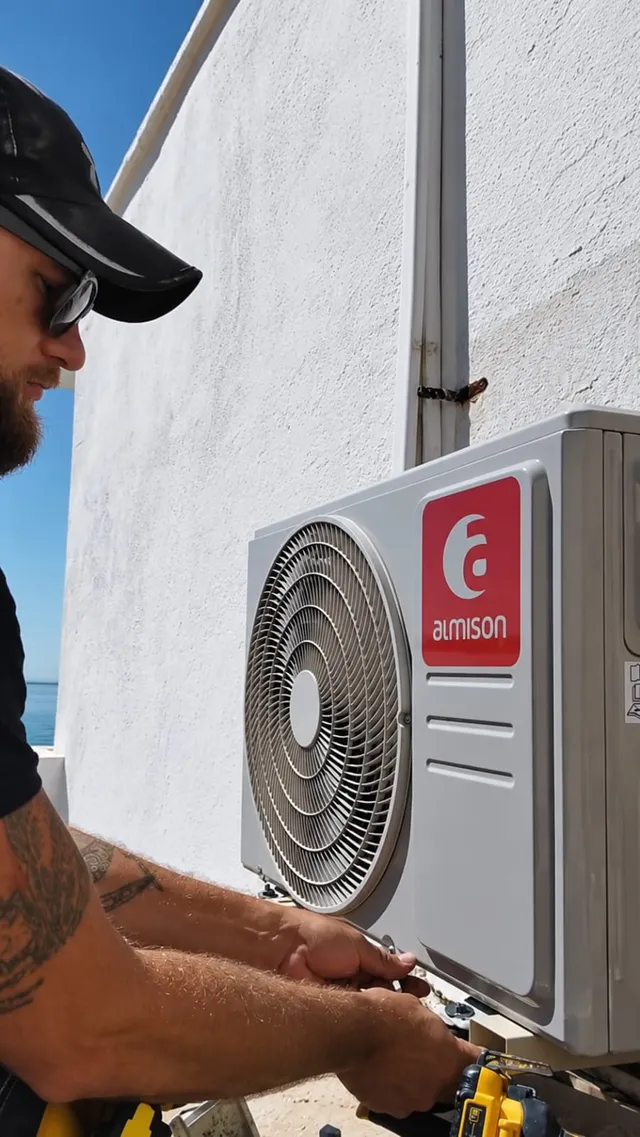 Outdoor condenser unit installation on a coastal terrace